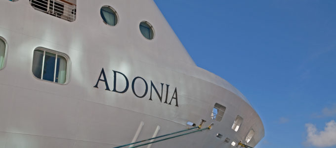 Close up of the name "Adonia" on the side of a ship